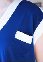 Dark blue sleeveless vintage dress with white trimmings